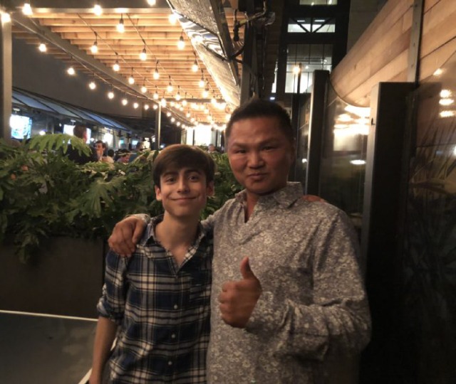 Master Tommy Chang with Hollywood actor at a stunt industry gathering.