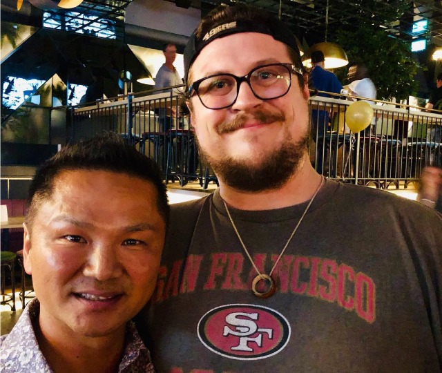 A portrait of a master instructor and a student during a community networking event and adult fitness social in Burlington